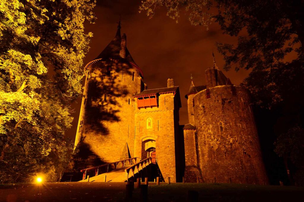 Castell Coch lit up in gold, 2015