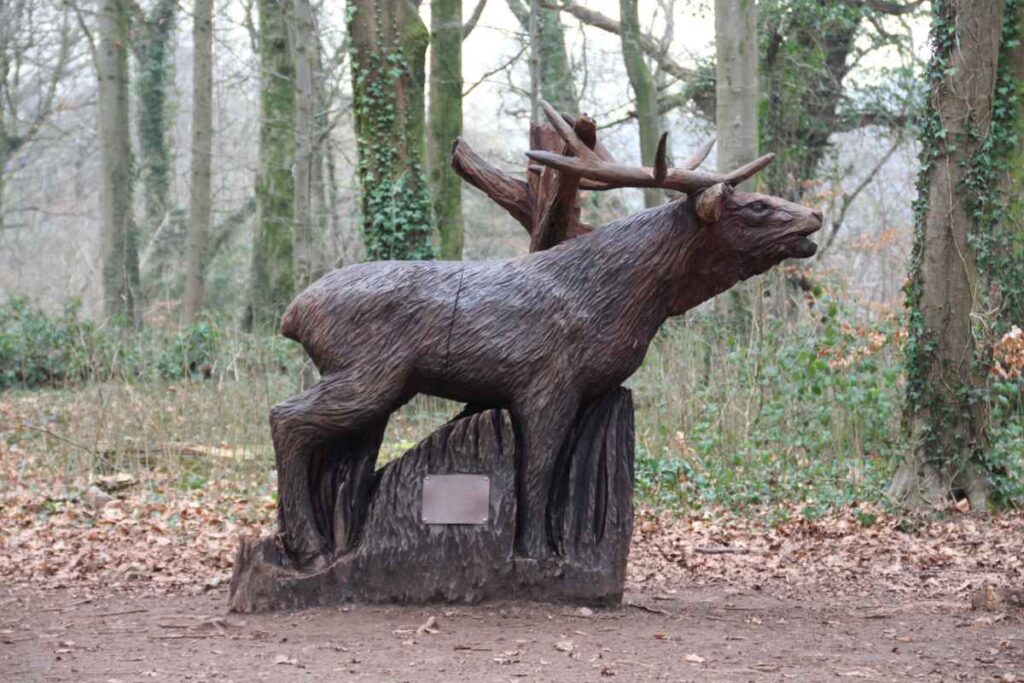 Wooden sculpture of deer