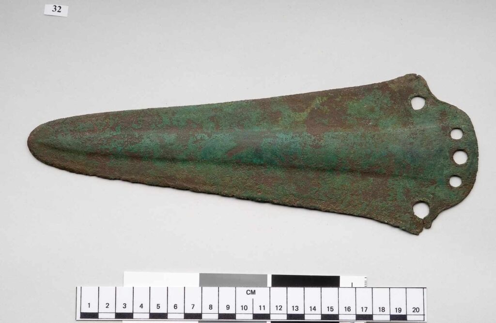 Copper halberd with five rivet-holes and central mid-rib
